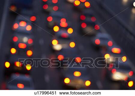 Stock Image - Tail Lights Shining Brightly In A Traffic Jam On Motorway. Fotosearch