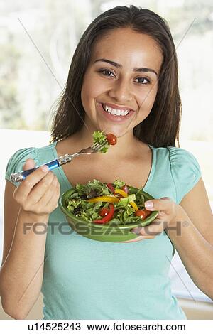 Teenage Girl Eating A Salad View Large Photo Image Stock Image - Teenage Girl Eating A Salad. Fotosearch