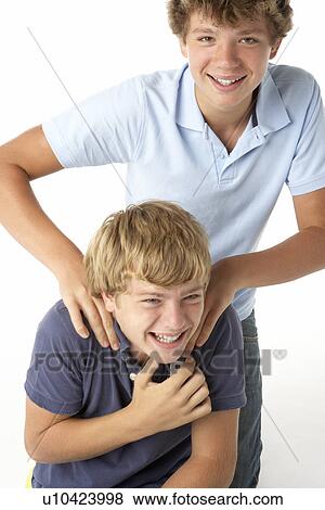 Stock Photo - Two Brothers Playing. Fotosearch