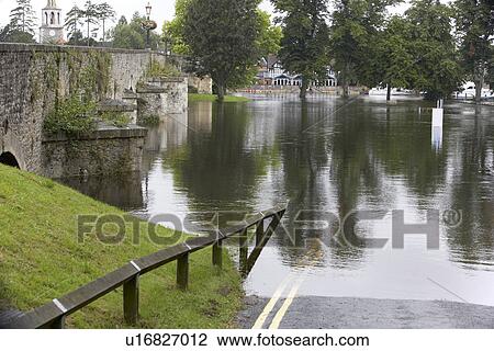 Stock Image - Water Flooding Roads. Fotosearch