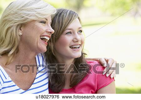 Woman And Her Teenage Daughter View Large Photo Image Stock Photograph - Woman And Her Teenage Daughter. Fotosearch