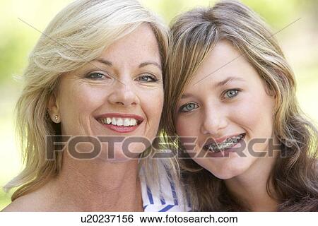 Stock Photograph - Woman And Her Teenage Daughter. Fotosearch