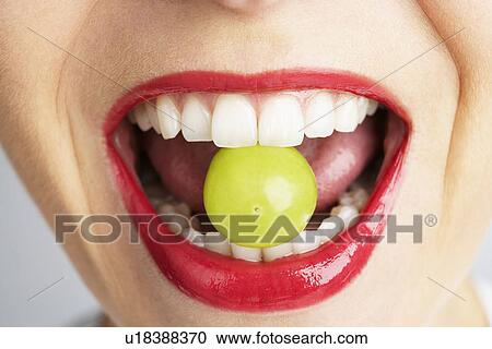 Woman Biting Grape View Large Photo Image Stock Image - Woman Biting Grape. Fotosearch