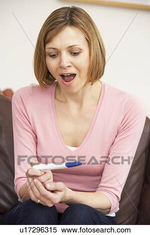 Woman Gets Result From Pregnancy Test View Large Photo Image Stock Photography - Woman Gets Result From Pregnancy Test. Fotosearch