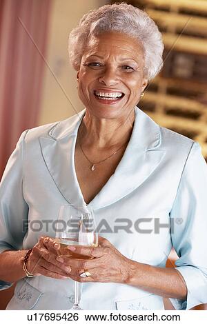 Woman Having A Glass Of Wine At A Bar View Large Photo Image Stock Photograph - Woman Having A Glass Of Wine At A Bar. Fotosearch