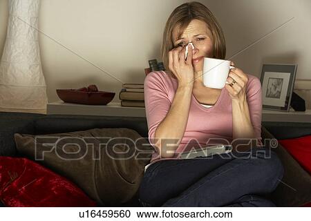 Woman Relaxing With Cup Of Coffee Watching Television View Large Photo Image Stock Image - Woman Relaxing With Cup Of Coffee Watching Television. Fotosearch