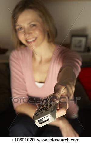 Woman Using Television Remote Control View Large Photo Image Stock Image - Woman Using Television Remote Control. Fotosearch