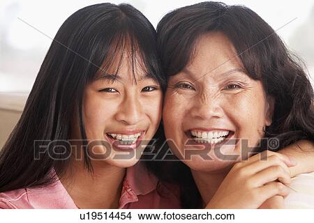 Picture - Woman With Her Teenage Daughter. Fotosearch
