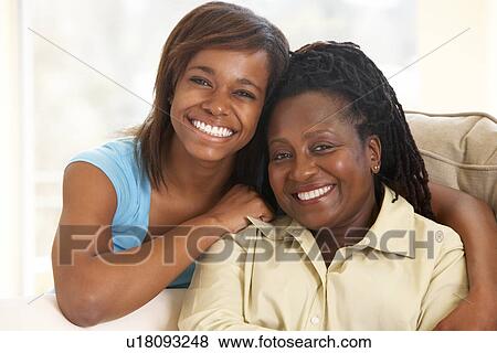 Woman With Her Teenage Daughter View Large Photo Image Stock Photo - Woman With Her Teenage Daughter. Fotosearch