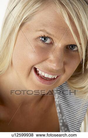 Stock Photo - Young Blonde Woman Smiling. Fotosearch