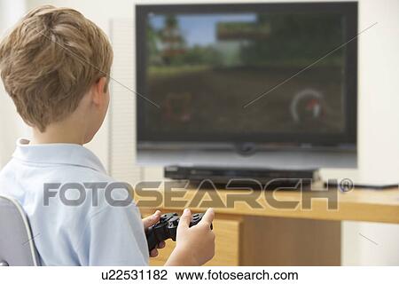 Young Boy Playing With Game Console View Large Photo Image Stock Image - Young Boy Playing With Game Console. Fotosearch