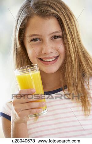 Young Girl Drinking Orange Juice View Large Photo Image Stock Photo - Young Girl Drinking Orange Juice. Fotosearch