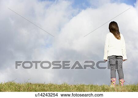 Young Girl Standing In The Park View Large Photo Image Picture - Young Girl Standing In The Park. Fotosearch