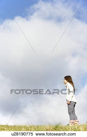 Young Girl Standing In The Park View Large Photo Image Stock Photography - Young Girl Standing In The Park. Fotosearch