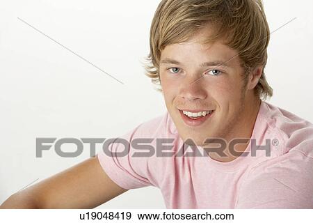 Stock Photo - Young Man Smiling. Fotosearch