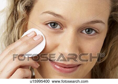 Young Woman Applying Make-Up View Large Photo Image Stock Image - Young Woman Applying Make-Up. Fotosearch