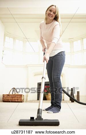 Young Woman Doing Housework View Large Photo Image Stock Photo - Young Woman Doing Housework. Fotosearch