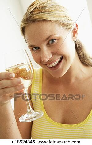 Stock Photography - Young Woman Drinking A Glass Of Wine. Fotosearch
