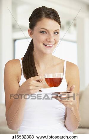 Young Woman Drinking Herbal Tea View Large Photo Image Stock Photo - Young Woman Drinking Herbal Tea. Fotosearch