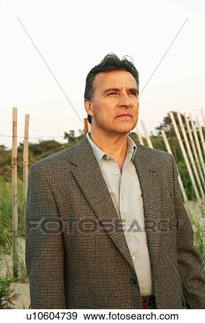 Close-up of a mature man View Large Photo Image Stock Photo - Close-up of a mature man. Fotosearch