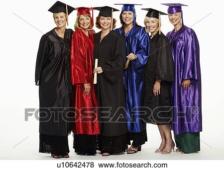 Portrait of a group of mature women wearing graduation gowns and standing together View Large Photo Image Stock Photo - Portrait of a group of mature women wearing graduation gowns and standing together. Fotosearch