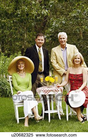 Portrait of a mature couple smiling with a mature man and a senior woman View Large Photo Image Stock Photography - Portrait of a mature couple smiling with a mature man and a senior woman. Fotosearch