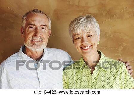 Portrait of a mature man and a senior woman smiling View Large Photo Image Stock Photograph - Portrait of a mature man and a senior woman smiling. Fotosearch