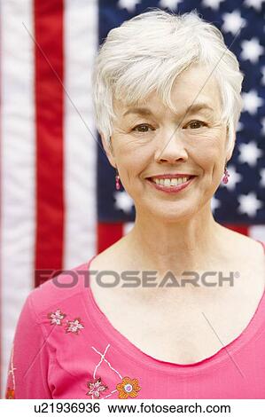 Portrait of a senior woman smiling View Large Photo Image Stock Photograph - Portrait of a senior woman smiling. Fotosearch