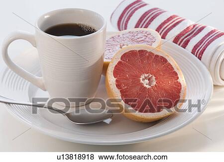 Blueberry cake with coffee cup in background View Large Photo Image Stock Photo - Blueberry cake with coffee cup in background. Fotosearch