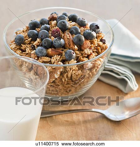 Stock Photography - Bowl of cereal with berries. Fotosearch