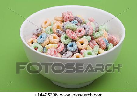 Stock Photograph - Bowl of colorful cereal rings. Fotosearch