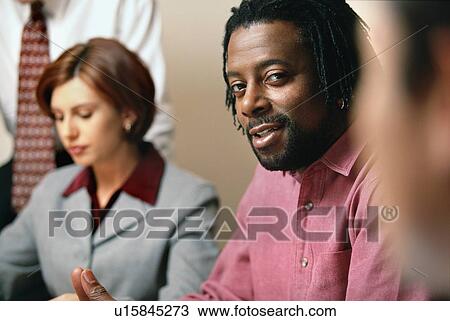 Stock Image - Businessman o business meeting. Fotosearch