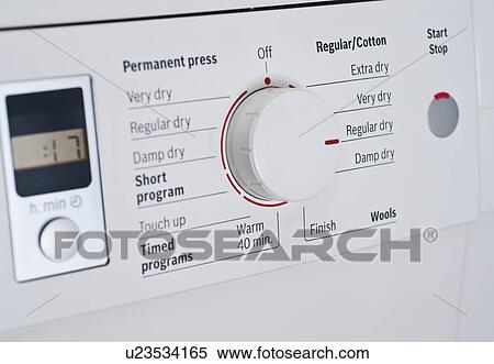 Stock Photography - Close up of Dial on Washing Machine. Fotosearch