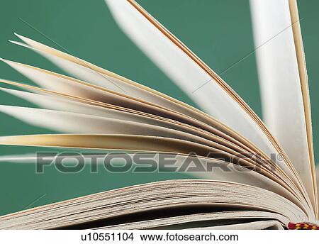 "Close-up of open book, studio shot" View Large Photo Image Picture - "Close-up of open book, studio shot". Fotosearch