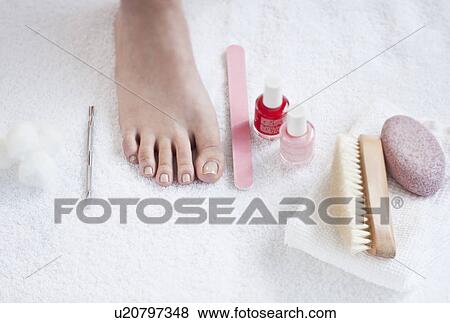 Close-up of woman's foot having pedicure View Large Photo Image Stock Photo - Close-up of woman's foot having pedicure. Fotosearch