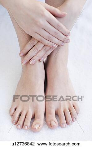 Close-up of woman's hands and feet View Large Photo Image Stock Image - Close-up of woman's hands and feet. Fotosearch