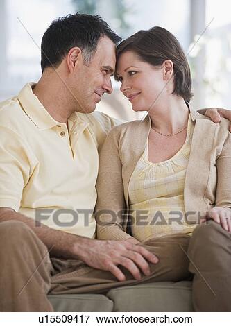 Stock Photo - Couple looking in eyes. Fotosearch