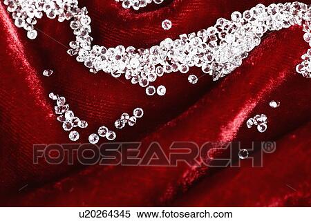 Stock Photography - Diamonds on red velvet. Fotosearch