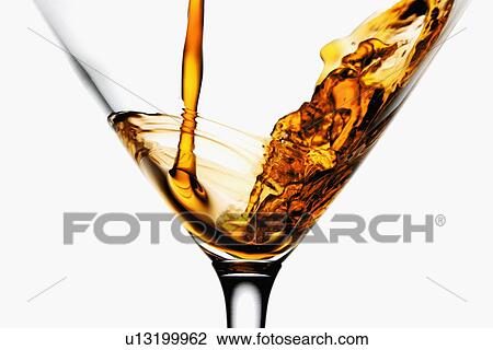 "Drink being poured into wineglass, close-up" View Large Photo Image Stock Image - "Drink being poured into wineglass, close-up". Fotosearch