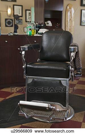 Empty chair in barber shop View Large Photo Image Stock Photo - Empty chair in barber shop. Fotosearch