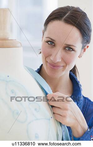 "Female tailor at work, portrait" View Large Photo Image Stock Image - "Female tailor at work, portrait". Fotosearch