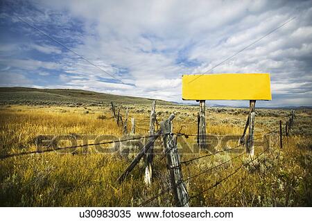 Stock Photography - "Field and fence, Steamboat Springs, Colorado, USA". Fotosearch