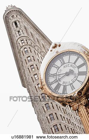 Stock Image - "Flatiron Building and clock, Manhattan, New York City, New York, USA". Fotosearch