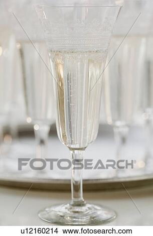 "Glass of champagne, close-up, still life" View Large Photo Image Picture - "Glass of champagne, close-up, still life". Fotosearch