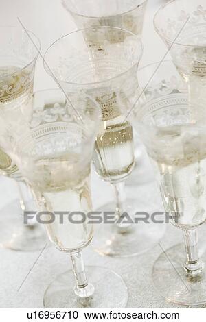 "Glasses of champagne, elevated view, still life" View Large Photo Image Stock Image - "Glasses of champagne, elevated view, still life". Fotosearch