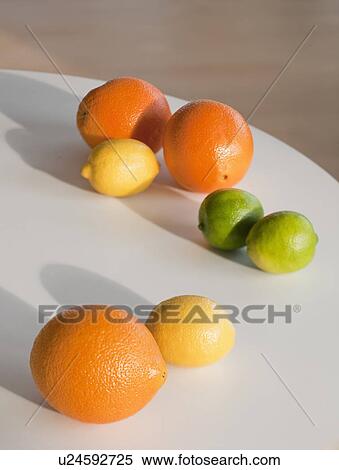"Limes, citruses and oranges on table" View Large Photo Image Stock Photography - "Limes, citruses and oranges on table". Fotosearch