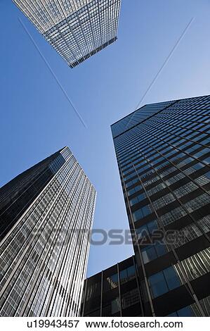 "Low angle view of skyscrapers, New York City, New York, USA" View Large Photo Image Stock Photo - "Low angle view of skyscrapers, New York City, New York, USA". Fotosearch