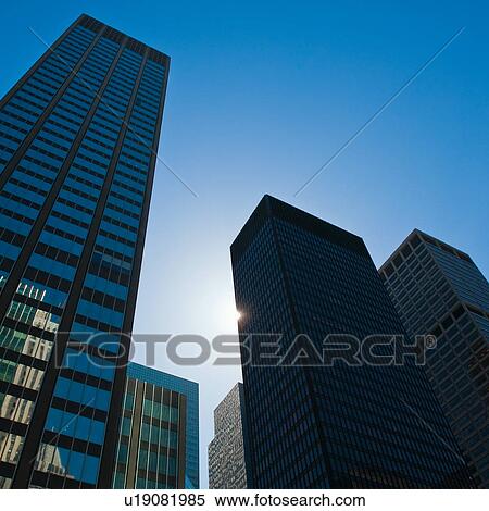 Stock Photography - "Low angle view of skyscrapers, New York City, New York, USA". Fotosearch