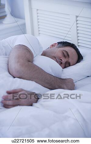 Stock Photography - Mature man sleeping. Fotosearch