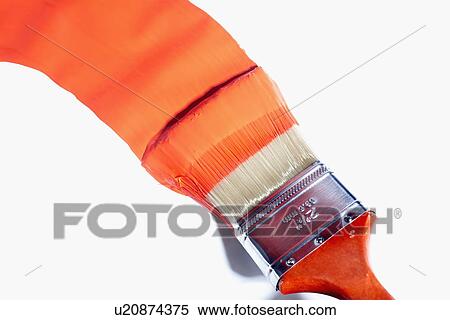 Stock Photography - Paintbrush with orange paint. Fotosearch